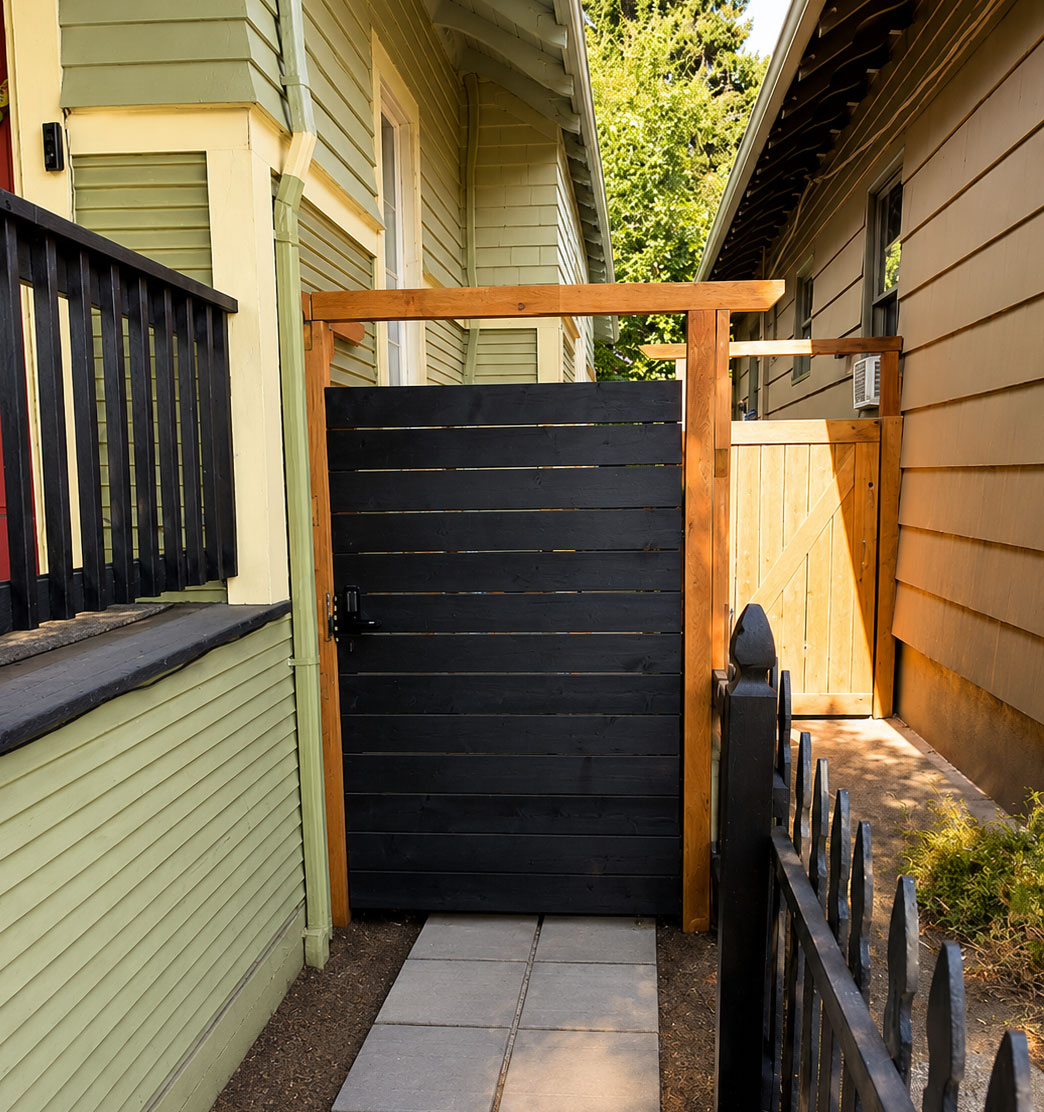 Gate going into my backyard, built with a modern design and custom hardware.